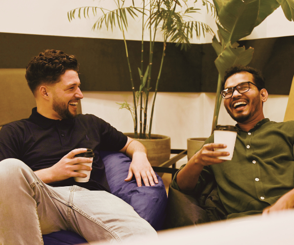 Automatische Compliance Tracking voor Milieumanagers | Altijd Audit-Klaar laughing with coffee